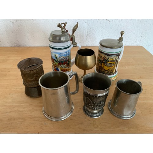 66 - Collection of Steins, Pewter Tankards, Ornate Goblet and Musical Carousel Money Box