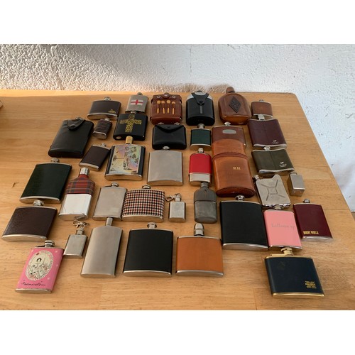 69 - Very Large Collection of Leather Bound, Glass, Stainless Steel and Novelty Hip Flasks