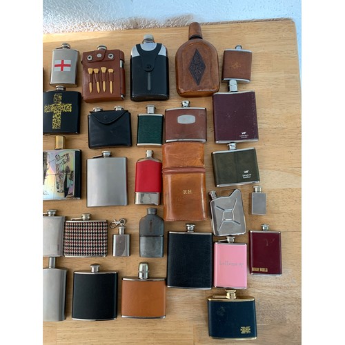 69 - Very Large Collection of Leather Bound, Glass, Stainless Steel and Novelty Hip Flasks