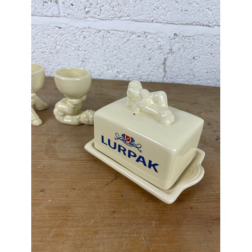 274 - Group of Lurpak Collectables Egg Cups, Toast Rack & Butter Dish