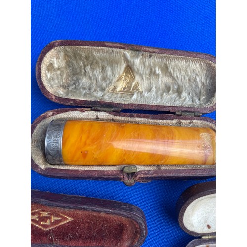 48 - Three Antique Cased Cheroot Holders in Amber & Silver