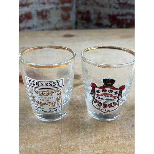 251 - Four Branded Vintage Shot Glasses