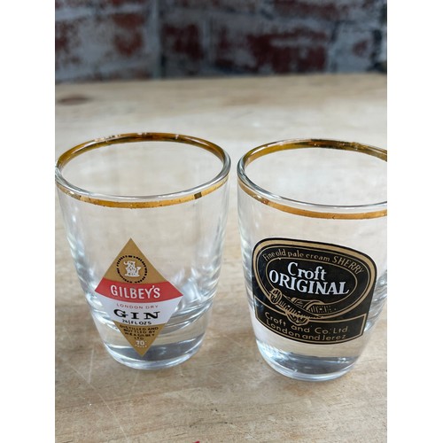 251 - Four Branded Vintage Shot Glasses