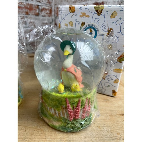 36 - The World Of Beatrix Potter, Perter Rabbit. Snow Globes, Waterballs x2 Jemima Puddle-duck & Mrs Tigg... 