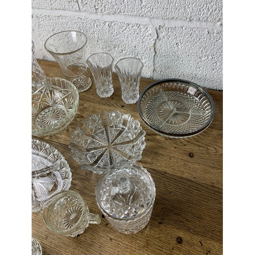 251 - Large Collection of Decorative Glass Bowls, Nibble Trays, Jugs Etc.