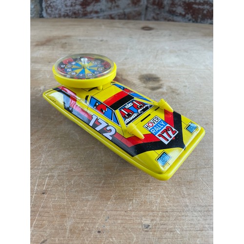 43 - Vintage Tin Hover Rally Car Roulette Game