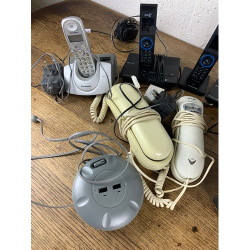 377 - Collection of Cordless and Corded Home phones and very large collection of Chargers/Transformers