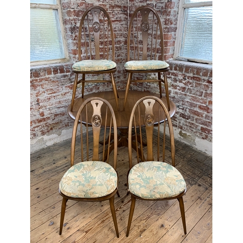 439 - Ercol Golden Dawn Extending Dining Table and Four High Backed Ercol Swan Dining Chairs