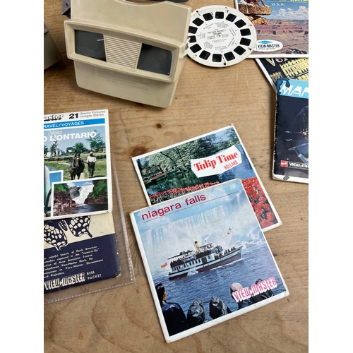 92 - Viewmaster Sawyers Viewers x2 & Projector With A Quantity Of Reels.