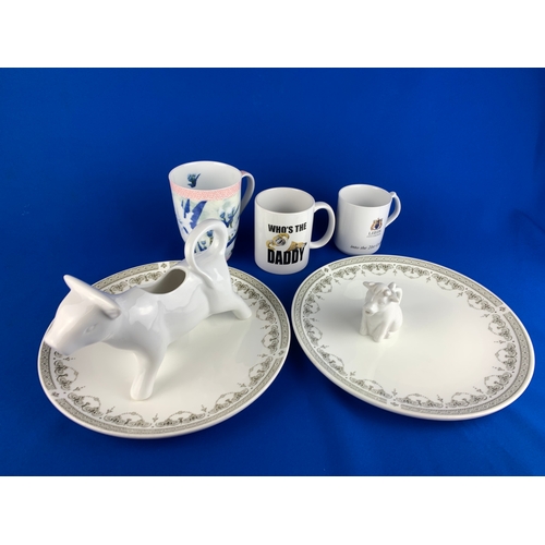 309 - Wedgwood China Metalised Plates, Cow Themed Milk Jugs etc.