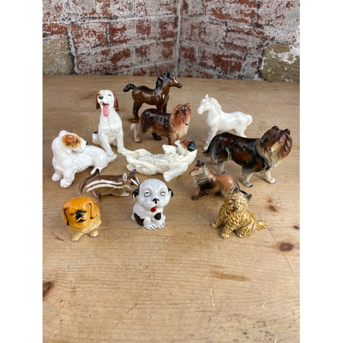 204 - Group Of Porcelain Dogs & Horses Inc. Beswick, Royal Doulton & Wade