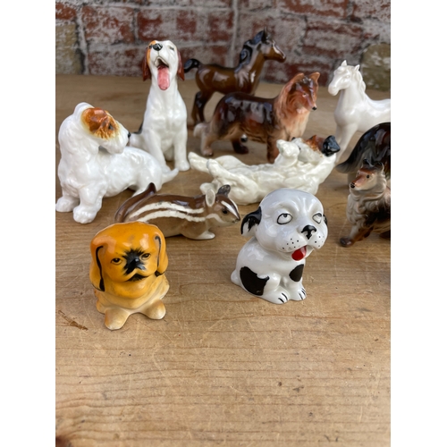 204 - Group Of Porcelain Dogs & Horses Inc. Beswick, Royal Doulton & Wade