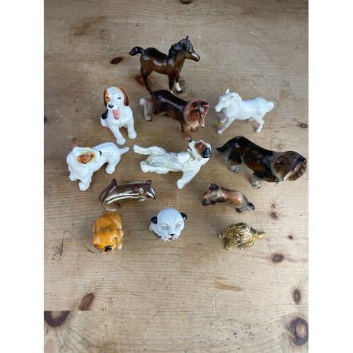 204 - Group Of Porcelain Dogs & Horses Inc. Beswick, Royal Doulton & Wade