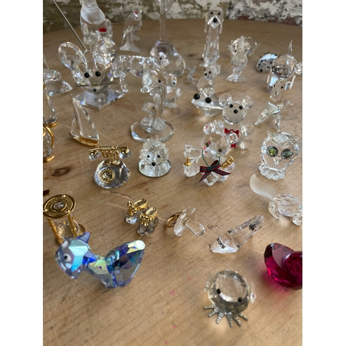 296 - Approximately 50 Swarovski Crystal Items