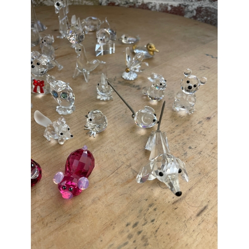 296 - Approximately 50 Swarovski Crystal Items