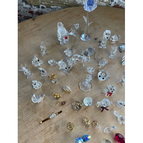 296 - Approximately 50 Swarovski Crystal Items