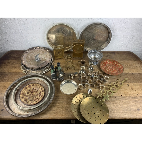 273 - Very Large selection of Metalware inc. Brass Strainers, Seven Trays, Enamelled Plates, Napkin Rings,... 