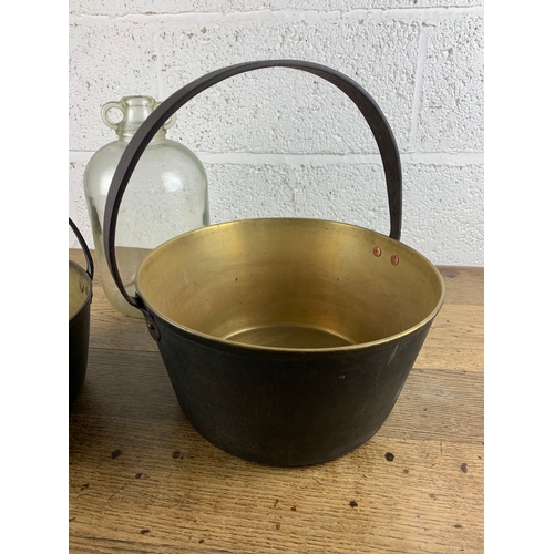 239 - Medium and Large Heavy Brass Jam Pans and Carboy/Demijohn