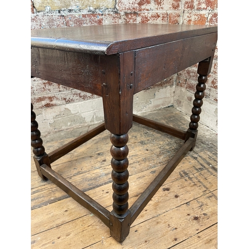 414 - Antique Oak Bobbin Turned Leg Side Table With Carved Drawer.