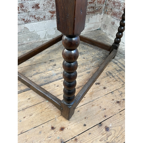 414 - Antique Oak Bobbin Turned Leg Side Table With Carved Drawer.