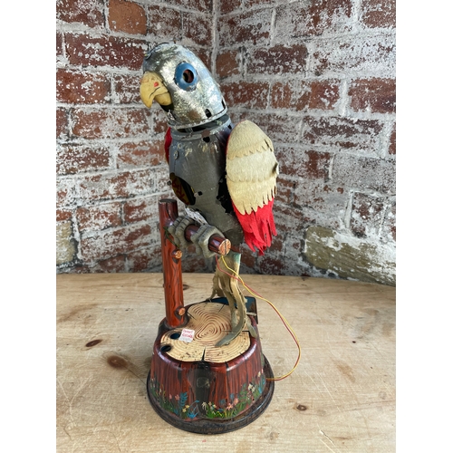 119 - Vintage Tinplate Parrot Automotion Toy