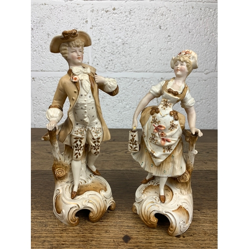 412 - Pair of Conte & Boehme Antique Figurines