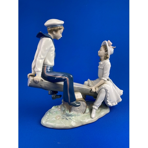 381 - Lladro Figure, Boy & Girl On Seesaw Model 1255