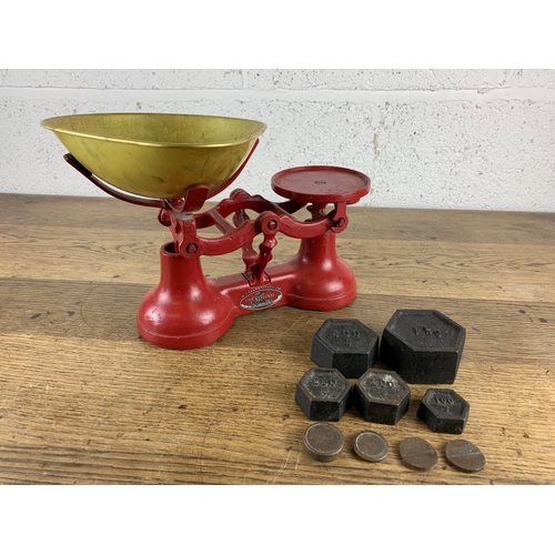 487 - F. J Thornton & Co. Red Viking Scales with a selection of weights