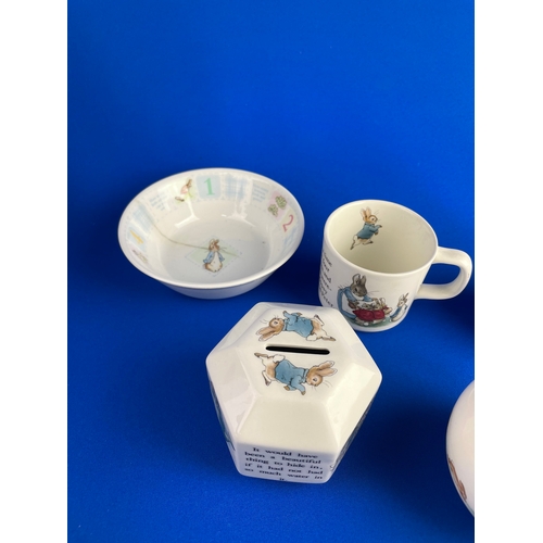 261 - Wedgwood & Royal Doulton Peter Rabbit Items Inc. Money Boxes & Cups