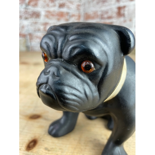 247 - 1920's Ceramic Black Bulldog Figure. Made In England With Glass Eyes.