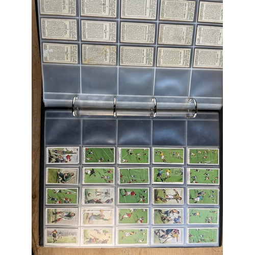 122 - Album of 500 Cigarette Football Cards. See All Photographs.