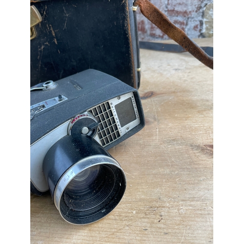 401 - Bell & Howell Cine Camera With Leather Case