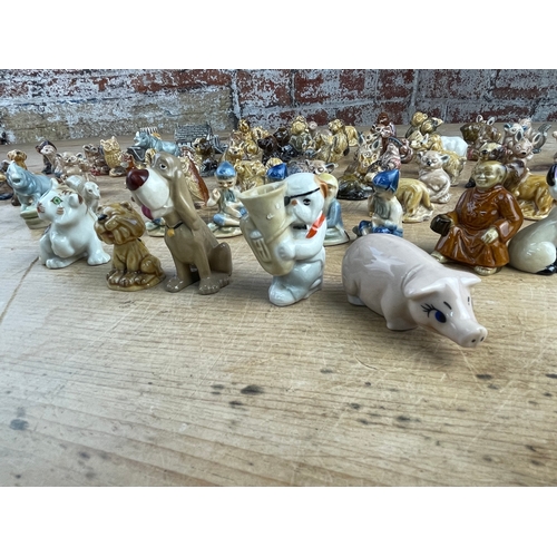 385 - Large Quantity Of Wade Whimsies & Other Miniature Figures