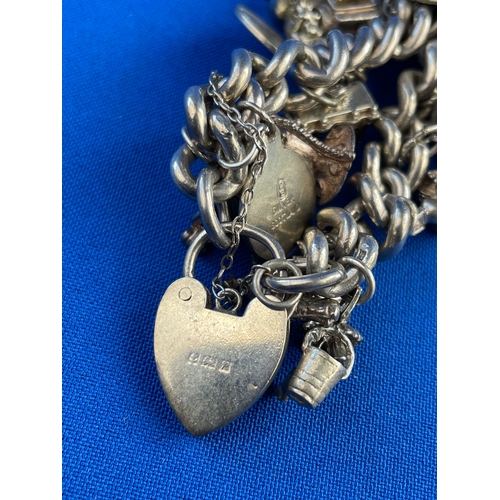 21 - Sterling Silver Charm Bracelet 105.96g