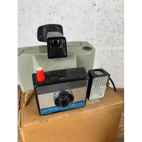 420 - Polaroid Swinger Sentinal Boxed with Instructions and Boxed Diana Camera