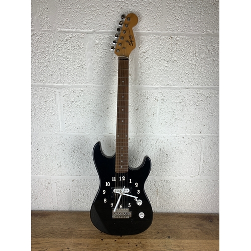 414 - Squire Strat Electric Guitar Made into a Clock a/f