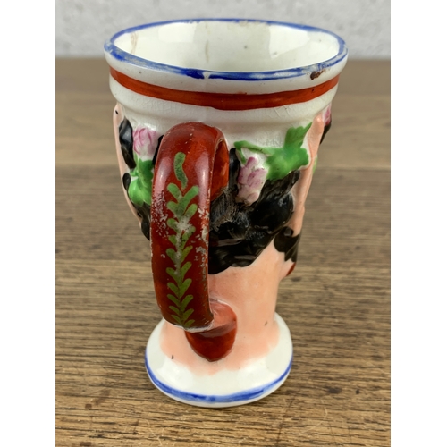 373 - Antique Staffordshire Bacchus Satyr Jug