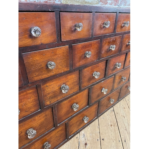 313 - 19th Century Bank Of 45 Apothecary Drawers. Original Glass Handles On All But One Of These Decorativ... 