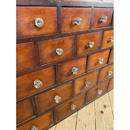 313 - 19th Century Bank Of 45 Apothecary Drawers. Original Glass Handles On All But One Of These Decorativ... 