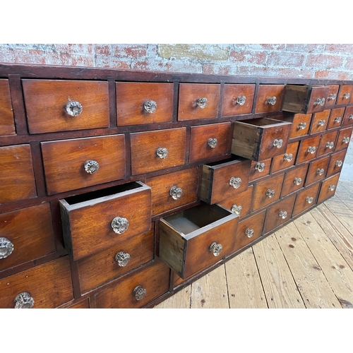 313 - 19th Century Bank Of 45 Apothecary Drawers. Original Glass Handles On All But One Of These Decorativ... 