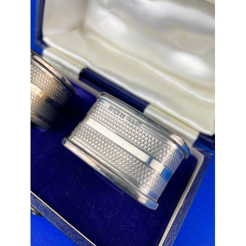 24 - Boxed Sterling Silver Napkin Rings 31.4g. Birmingham 1954.