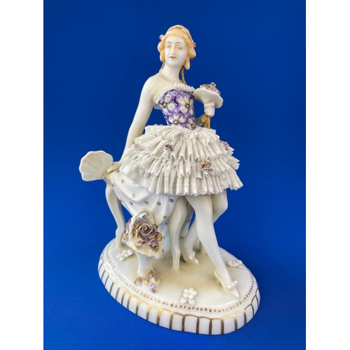 309 - 1930's E A Muller Schwarza Porcelain Figure. Damage to Skirt Lattice Work.