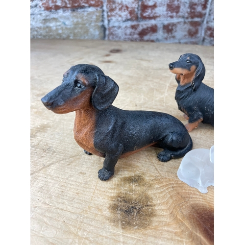 214 - Four Dachshund Figures