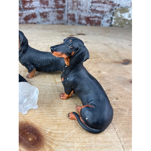 214 - Four Dachshund Figures