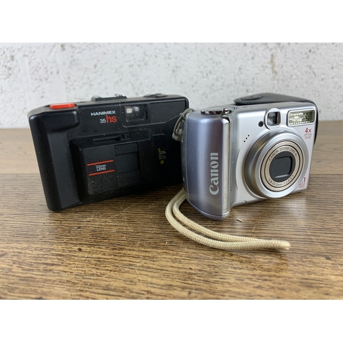 388 - Canon Powershot A550 Digital Camera with SD CArd and Case and Hanimex 35HS Camera