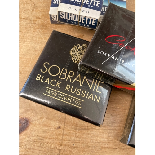 90 - Seven Sealed Packets Of Vintage Cigarettes Inc 20 Sobranie Cocktail, 40 Sobranie Black Russian & 40 ... 