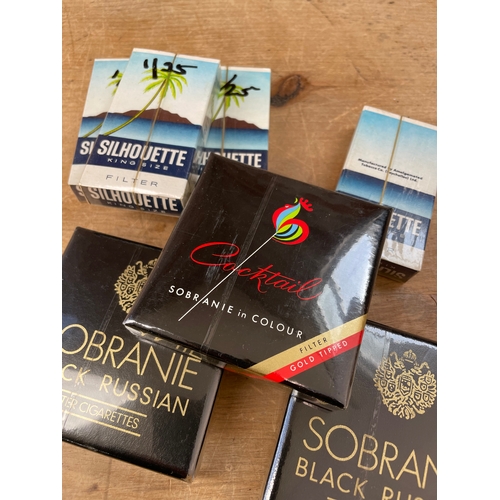 90 - Seven Sealed Packets Of Vintage Cigarettes Inc 20 Sobranie Cocktail, 40 Sobranie Black Russian & 40 ... 