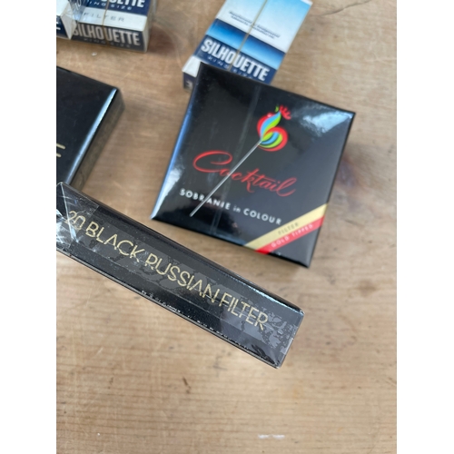 90 - Seven Sealed Packets Of Vintage Cigarettes Inc 20 Sobranie Cocktail, 40 Sobranie Black Russian & 40 ... 