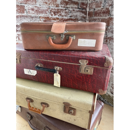 124 - Four Vintage Suitcases