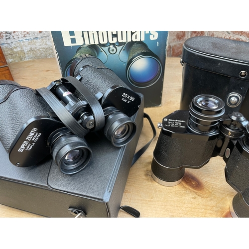 135 - Three Sets Of Vintage Binoculars Inc. Bell & Howell, Super Zenith & Boots